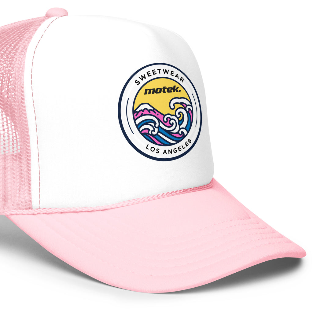 Pink and white cap with a logo on a white background